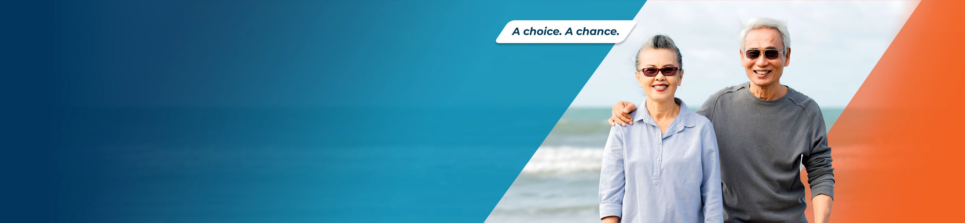 Potential OPDIVO® (nivolumab) user and her husband standing on a beach.